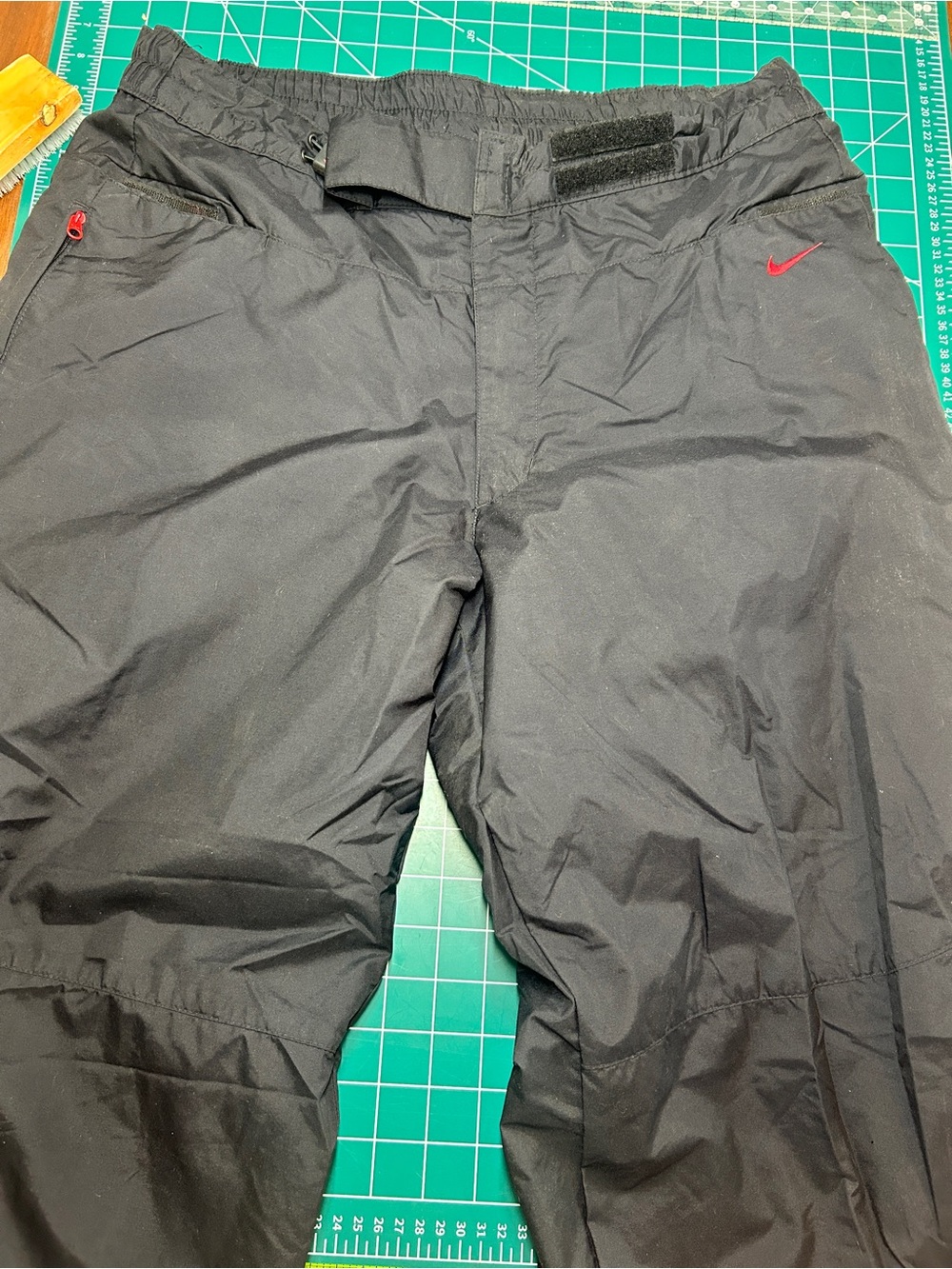 Vintage Nike Men's Black Athletic Track Pants with Red Accent